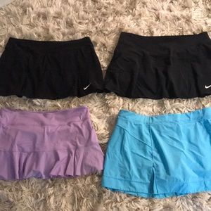 4 Nike Large Tennis skirts